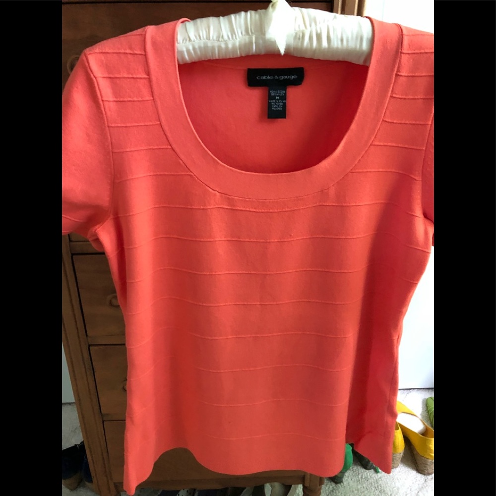 Soft orange lightweight summer top.